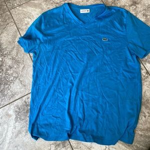 Large Lacoste blue v neck short sleeve tee shirt